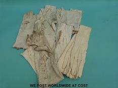 A quantity of vintage leather white kid gloves in J & R Morley's deerskin gloves box