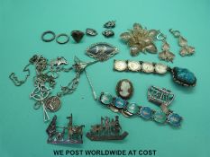 A silver and enamel bracelet, earrings and brooch,