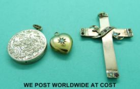 A 15ct gold heart pendant set with a diamond,