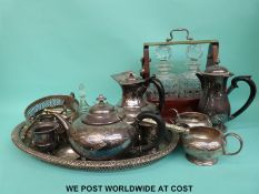 Two bottle tantalus and a collection of plated ware including tray, teaware etc.