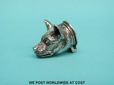 A white metal snuff box or trinket pot formed as a dog's head with hinged lid, stamped 925,