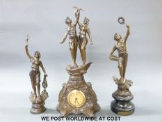 A circa 1910 figural bronzed spelter clock garniture, stamped to back Fas. Co.