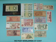 A collection of world and UK bank notes including Central Bank of Egypt, Italy, Singapore,