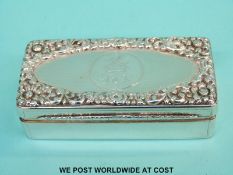 A Victorian hallmarked silver snuff box with engine turned and foliate decoration to lid,