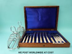 A Mappin Brothers cased plated fish service together with a pair of plated toast racks