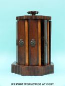 A 19thC / 20thC mahogany cigar holder with revolving mechanism, height 20.