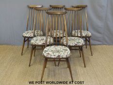 An Ercol draw leaf table and six chairs
