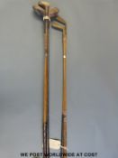 Vintage Marc Charles golf clubs in bag, three vintage woods, hickory shafted irons,
