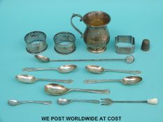 A quantity of hallmarked silver items to include tankard, height 8cm, three various napkin rings,