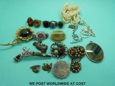 A collection of costume jewellery to include a silver brooch, silver ring, Miracle brooch,