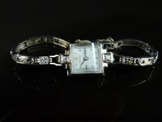 Movado 14ct gold Art Deco diamond inset ladies wristwatch with blued hands and gold markers,