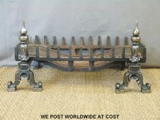 A large fire basket and two dogs,