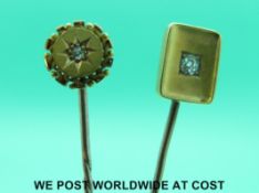 A yellow metal stick pin set with an old cut diamond in a rectangular gold setting and a yellow