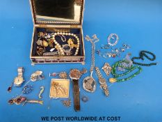 A quantity of costume jewellery to include a large silver necklace set with quartz, silver rings,
