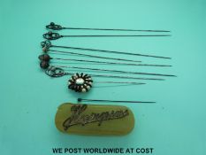 A collection of hat pins including four hallmarked Charles Horner, two white metal examples,
