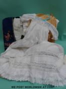 A quantity of items to include ladies gloves, silk handkerchief, christening gown,