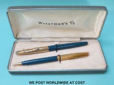 A cased Waterman's C/F fountain pen and propelling pencil set with 18k gold nib