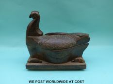 A Scandinavian/Norwegian treen hen pot on wheels,