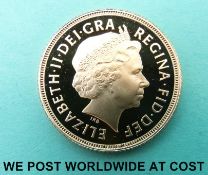 A cased 2002 gold proof full sovereign with certificate of authenticity