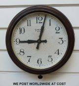A Smiths retro bakelite dial wall clock with bold Arabic numerals and 8 day movement,