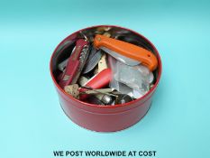 A quantity of folding knives, hallmarked silver sugar tongs etc.