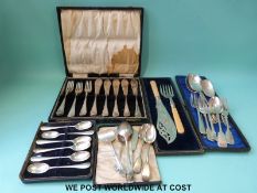 A quantity of boxed and loose silver plated cutlery