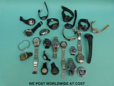 Over 20 various ladies and gentleman's wristwatches including Casio, Adidas etc.