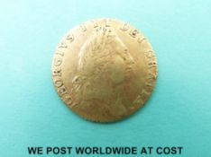 A 1787 George III gold half spade guinea