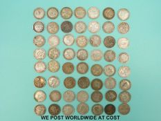 Over 50 silver threepence pieces,