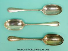 A set of three Victorian hallmarked silver Hanovarian rat tail pattern table spoons,