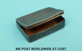 A hallmarked silver snuff box with engine turned decoration and gilt interior,