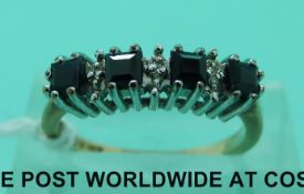 A 9ct gold ring set with sapphires and diamonds (size L)