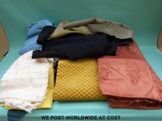 A box containing fabric suitable for clothes/dress making to include off-cuts of blue cord material,