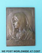 A bronze plaque of the Virgin Mary by E.