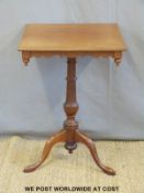 A 19th century square mahogany tilt top table with shaped apron raised on a tripod base (W48 x D48