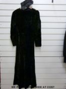 A 1930/40's black velvet evening or cocktail dress with button shoulders and matching bead work