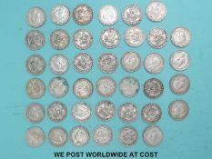 Approximately 222g of UK pre 1947 shillings