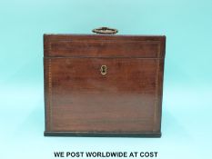 A Georgian mahogany inlaid apothecary chest with sectional interior containing 19thC glass bottles