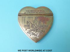 A brass heart shaped hinged table top snuff box 'The Prince of Wales and Colonel McMahon',