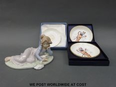 A Lladro figure, girl with ducks, boxed Worcester pin dishes decorated with golf clubs etc.