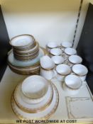 A Paragon Athena part dinner/coffee service together with Royal Doulton Gold Lace plates
