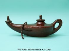 Tiffany Studios New York bronze table lighter in the form of a Roman lamp,