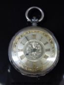 Continental silver pocket watch with self coloured and jewelled dial,