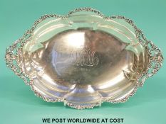 A late 19thC Tiffany & Co white metal oval twin handled bowl with pierced and floral handles and