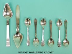 Eight various Georg Jensen hallmarked silver spoons comprising two grapefruit spoons, length 14.