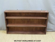 A mahogany wall shelf unit (W122 x D18 x H71cm)