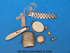 Two 9ct charms, 9ct gold cased watch, hallmarked silver vesta, silver bracelet, silver ingot,