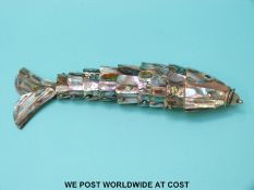 An articulated mother of pearl fish,