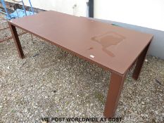 A large powder-coated brown metal industrial style table (H73cm x W200cm x D90cm)