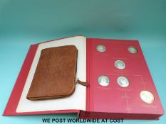 A 'Kings and Queens of England' album of silver proof coins,